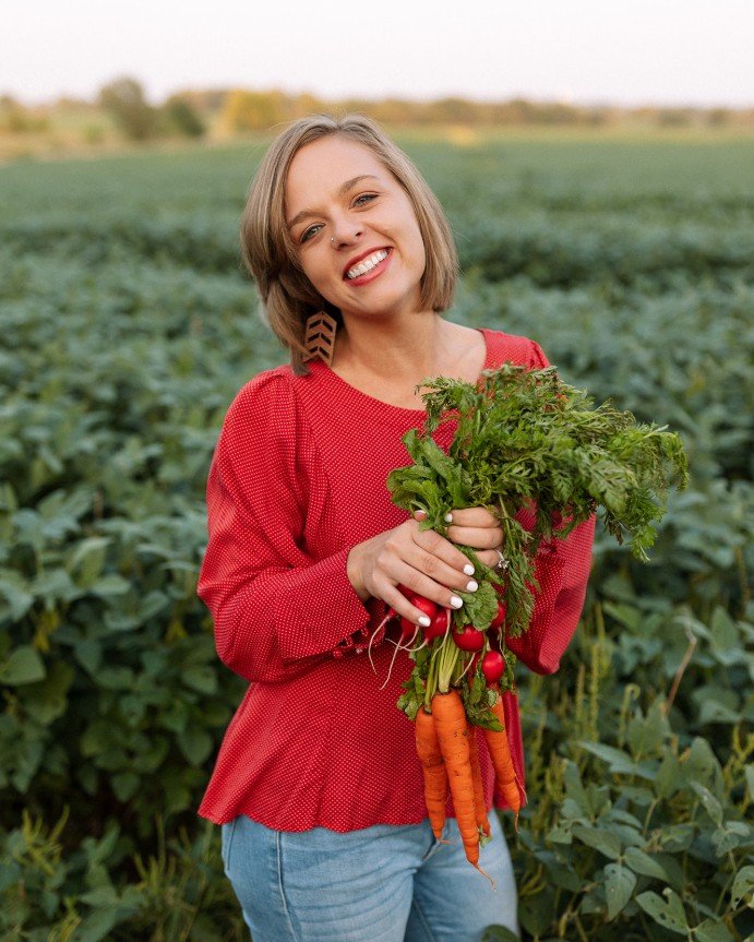 professional photo holding carrots